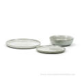 Reactive glazed stoneware dinner set in grey